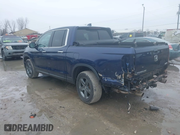 2022 Honda Ridgeline RTL-E with VIN 5FPYK3F72NB036226, listed as a IAAI auction lot 41706285 with 30,869 mi miles and . Bid and sale history available at DreamBid. Image 3.