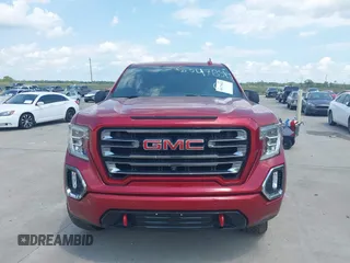 2021 GMC Sierra 1500 AT4 with VIN 1GTP9EEL0MZ284638, listed as a IAAI auction lot 40179412 with 117,272 mi miles. Bid and sale history available at carsss.com. Image 12.