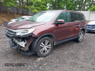 2016 Honda Pilot EX-L with VIN 5FNYF6H5XGB007876, listed as a IAAI auction lot 42366901 with 128,580 mi miles and . Bid and sale history available at DreamBid. Image 2.