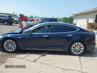 2014 Tesla Model S 60 with VIN 5YJSA1H17EFP65983, listed as a IAAI auction lot 42399288 with 166,365 mi miles and . Bid and sale history available at DreamBid. Image 15.