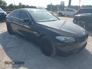 2012 BMW 5 Series 528i with VIN WBAXG5C58CDX05153, listed as a IAAI auction lot 42196906 with 120,652 mi miles. Bid and sale history available at carsss.com. Image 1.