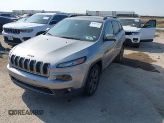2016 Jeep Cherokee Latitude with VIN 1C4PJLCB7GW256587, listed as a IAAI auction lot 42037539 with 209,267 mi miles. Bid and sale history available at carsss.com. Image 17.