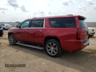 2015 Chevrolet Suburban LTZ with VIN 1GNSKKKC6FR556105, listed as a Copart auction lot 64034304 with 106,269 mi miles and Salvage Title. Bid and sale history available at DreamBid. Image 2.