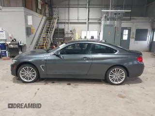 2014 BMW 4 Series 428i xDrive with VIN WBA3N9C56EF721564, listed as a IAAI auction lot 41737409 with 42,052 mi miles and . Bid and sale history available at DreamBid. Image 15.