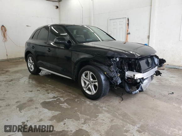 2018 Audi Q5 Premium with VIN WA1ANAFY1J2161661, listed as a Copart auction lot 55223385 with 60,554 mi miles and Salvage Title. Bid and sale history available at DreamBid. Image 4.