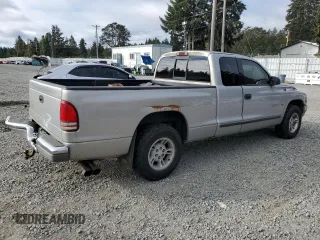 1997 Dodge Dakota with VIN 1B7GL23YXVS209874, listed as a Copart auction lot 72293644 with 112,573 mi miles and Salvage Title. Bid and sale history available at carsss.com. Image 3.