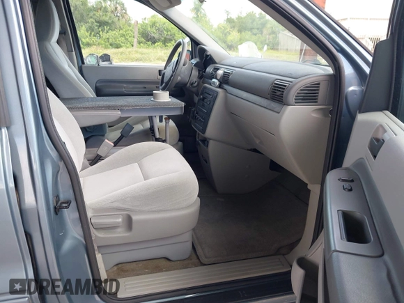 2004 Ford Freestar SES z VIN 2FMZA576X4BA05461, wystawiony jako IAAI lot #42255432 z przebiegiem 115 971 mil mil oraz . Historia ofert i sprzedaży dostępna na DreamBid. Obrazek 5.