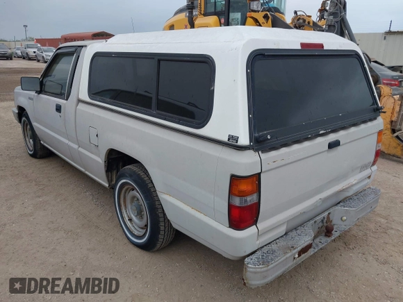 1990 Mitsubishi Mighty Max with VIN JA7FL24W6LP031144, listed as a IAAI auction lot 42152666 with 212,104 mi miles and . Bid and sale history available at DreamBid. Image 3.