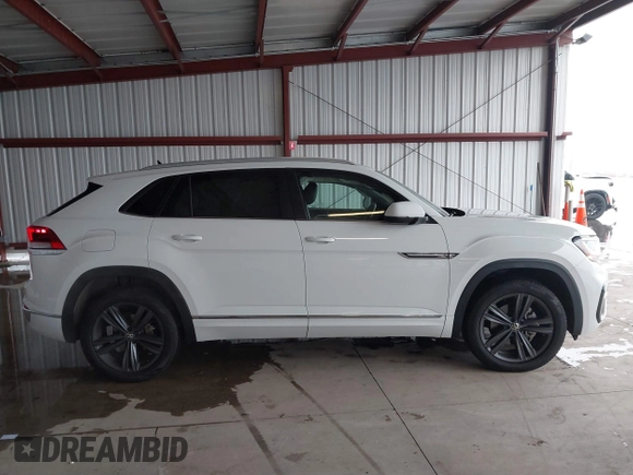 2021 Volkswagen Atlas SE z VIN 1V2NE2CA4MC201281, wystawiony jako IAAI lot #41242760 z przebiegiem 95 209 mil mil oraz . Historia ofert i sprzedaży dostępna na DreamBid. Obrazek 14.