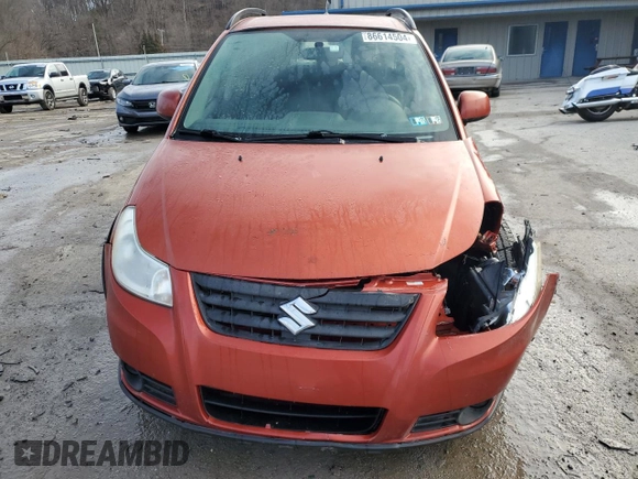 2013 Suzuki SX4 Crossover z VIN JS2YB5A37D6100222, wystawiony jako Copart lot #86614504 z przebiegiem 131 930 mil mil oraz Szkoda całkowita • Salvage title. Historia ofert i sprzedaży dostępna na DreamBid. Obrazek 5.