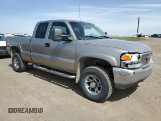 2000 GMC Sierra 2500 SLE z VIN 1GTGK29U1YE324924, wystawiony jako Copart lot #56182795 z przebiegiem 349 358 mil mil oraz Szkoda całkowita • Salvage title. Historia ofert i sprzedaży dostępna na DreamBid. Obrazek 4.