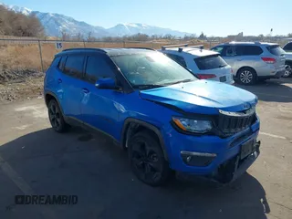 2020 Jeep Compass Latitude with VIN 3C4NJDBBXLT205244, listed as a IAAI auction lot 41395738 with 77,468 mi miles and . Bid and sale history available at carsss.com. Image 1.