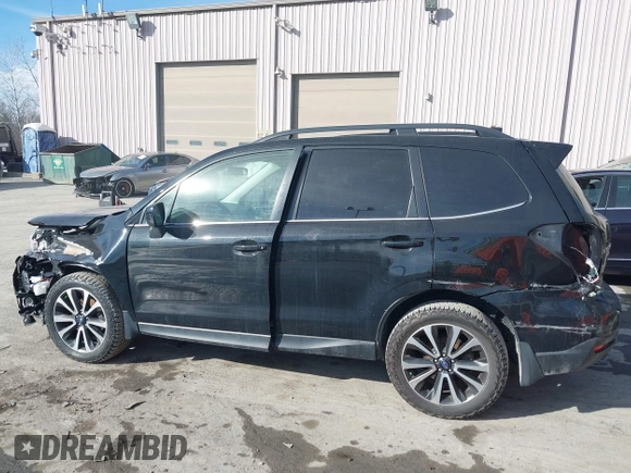 2017 Subaru Forester Premium with VIN JF2SJGEC9HH594118, listed as a IAAI auction lot 41634787 with 147,086 mi miles. Bid and sale history available at carsss.com. Image 14.