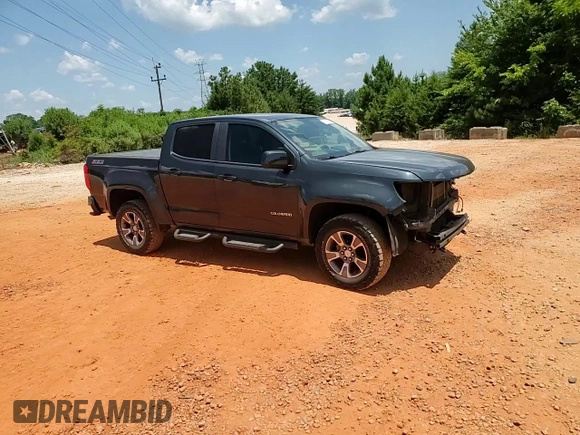 2018 Chevrolet Colorado 4WD Z71 z VIN 1GCGTDEN7J1110282, wystawiony jako Copart lot #61945695 z przebiegiem 144 792 mil mil oraz Szkoda całkowita • Salvage title. Historia ofert i sprzedaży dostępna na DreamBid. Obrazek 13.