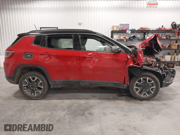 2021 Jeep Compass Trailhawk z VIN 3C4NJDDBXMT586981, wystawiony jako IAAI lot #42116028 z przebiegiem 70 317 mil mil oraz . Historia ofert i sprzedaży dostępna na DreamBid. Obrazek 14.