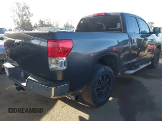 2011 Toyota Tundra z VIN 5TFRM5F15BX028699, wystawiony jako IAAI lot #41921139 z przebiegiem 147 811 mil mil oraz . Historia ofert i sprzedaży dostępna na DreamBid. Obrazek 4.