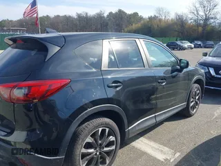 2016 Mazda CX-5 Grand Touring with VIN JM3KE4DY5G0681436, listed as a IAAI auction lot 41664780 with 172,199 mi miles. Bid and sale history available at carsss.com. Image 13.