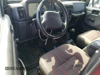 2000 Jeep Wrangler Sport with VIN 1J4FA49S4YP741154, listed as a Copart auction lot 71006864 with 200,684 mi miles and Clean Title. Bid and sale history available at carsss.com. Image 8.