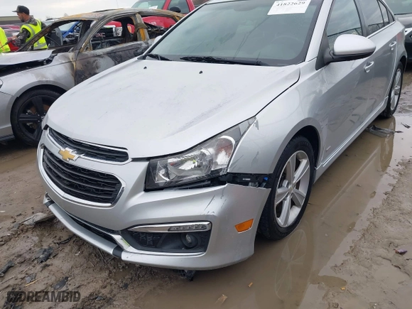 2015 Chevrolet Cruze LT with VIN 1G1PE5SB5F7113933, listed as a IAAI auction lot 41822629 with 100,576 mi miles. Bid and sale history available at carsss.com. Image 6.