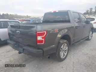 2018 Ford F-150 XL with VIN 1FTEW1C50JFD23545, listed as a IAAI auction lot 41838209 with 129,906 mi miles and . Bid and sale history available at DreamBid. Image 4.