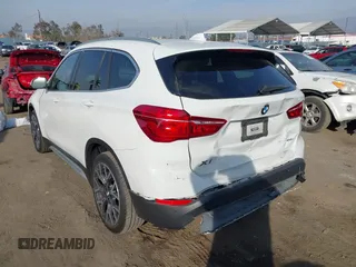 2022 BMW X1 sDrive28i with VIN WBXJG7C05N5U58988, listed as a IAAI auction lot 41466393 with 56,062 mi miles. Bid and sale history available at carsss.com. Image 3.