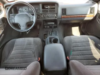 1997 Jeep Grand Cherokee TSi with VIN 1J4FX58SXVC545910, listed as a Copart auction lot 73142554 with 180,896 mi miles and Salvage Title. Bid and sale history available at carsss.com. Image 8.
