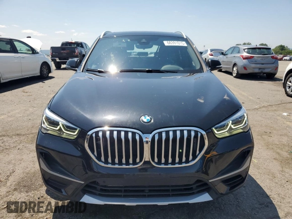 2021 BMW X1 xDrive28i with VIN WBXJG9C06M5S33201, listed as a Copart auction lot 66391015 with 53,395 mi miles and Salvage title. Bid and sale history available at DreamBid. Image 5.