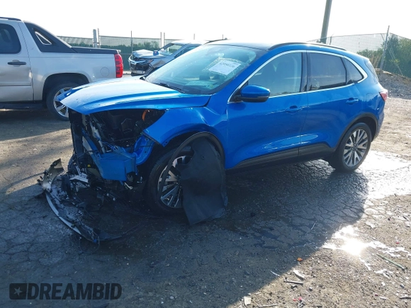 2020 Ford Escape Titanium Hybrid with VIN 1FMCU9DZ1LUB59214, listed as a IAAI auction lot 42050336 with 59,547 mi miles and . Bid and sale history available at DreamBid. Image 2.