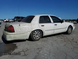 2005 Mercury Grand Marquis LS Premium z VIN 2MEFM75W95X618252, wystawiony jako Copart lot #57810045 z przebiegiem Nie podano mil oraz Czysty tytuł • Clean title. Historia ofert i sprzedaży dostępna na DreamBid. Obrazek 3.