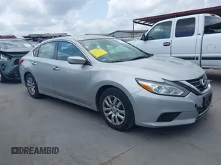 2016 Nissan Altima S z VIN 1N4AL3AP7GN349989, wystawiony jako IAAI lot #42074440 z przebiegiem 123 059 mil mil oraz . Historia ofert i sprzedaży dostępna na DreamBid. Obrazek 13.