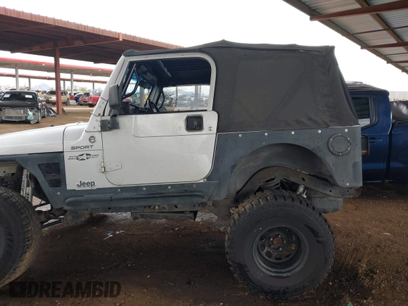 2006 Jeep Wrangler Sport with VIN 1J4FA49S46P748604, listed as a IAAI auction lot 41788157 with 128,249 mi miles. Bid and sale history available at carsss.com. Image 14.