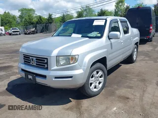 2007 Honda Ridgeline RTL z VIN 2HJYK16527H521549, wystawiony jako IAAI lot #42192558 z przebiegiem 227 162 mil mil oraz . Historia ofert i sprzedaży dostępna na DreamBid. Obrazek 2.