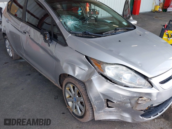 2013 Ford Fiesta SE with VIN 3FADP4EJ2DM173842, listed as a IAAI auction lot 42048262 with 82,637 mi miles. Bid and sale history available at carsss.com. Image 6.