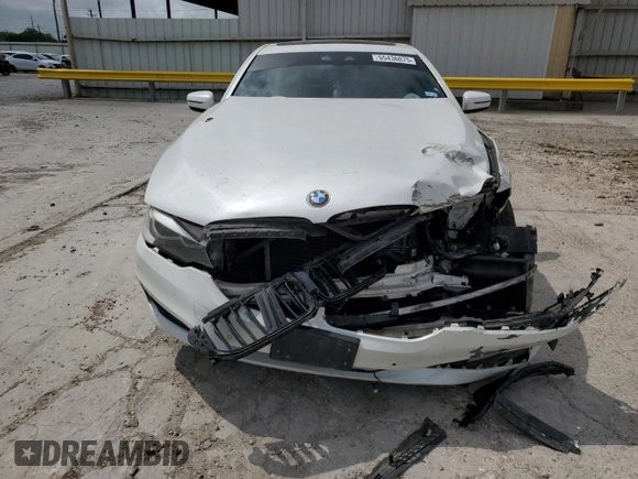 2018 BMW 5 Series 530i z VIN WBAJA5C50JG899776, wystawiony jako Copart lot #55436075 z przebiegiem Nie podano mil oraz Szkoda całkowita • Salvage title. Historia ofert i sprzedaży dostępna na DreamBid. Obrazek 5.