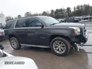 2019 GMC Yukon SLE with VIN 1GKS2AKC1KR385085, listed as a IAAI auction lot 41699370 with 83,889 mi miles. Bid and sale history available at carsss.com. Image 13.
