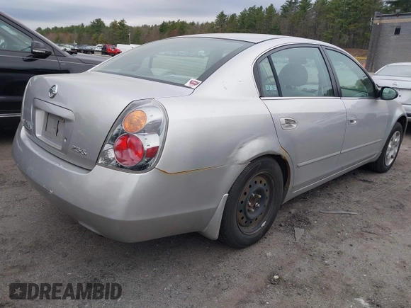 2003 Nissan Altima S with VIN 1N4AL11D33C265538, listed as a IAAI auction lot 42082079 with 180,138 mi miles. Bid and sale history available at carsss.com. Image 4.