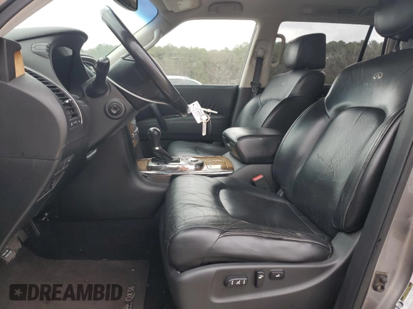2012 Infiniti QX56 8-passenger with VIN JN8AZ2ND4C9715207, listed as a Copart auction lot 43283955 with 191,935 mi miles and Salvage title. Bid and sale history available at DreamBid. Image 7.