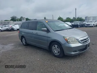 2007 Honda Odyssey EX-L z VIN 5FNRL38657B074826, wystawiony jako IAAI lot #42434356 z przebiegiem 237 969 mil mil oraz . Historia ofert i sprzedaży dostępna na DreamBid. Obrazek 1.