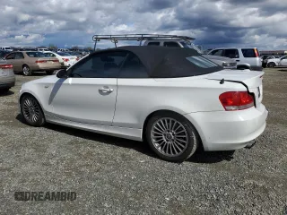 2008 BMW 1 Series 128i with VIN WBAUL73578VE88077, listed as a Copart auction lot 48655115 with 142,931 mi miles and Salvage title. Bid and sale history available at DreamBid. Image 2.
