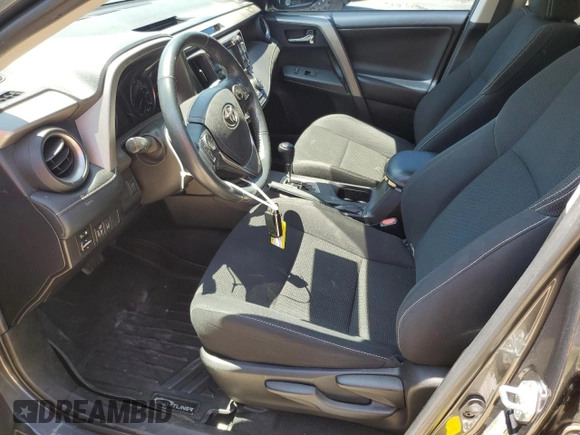 2018 Toyota RAV4 XLE with VIN 2T3WFREV2JW501793, listed as a Copart auction lot 52553015 with 67,918 mi miles and Salvage Title. Bid and sale history available at carsss.com. Image 7.
