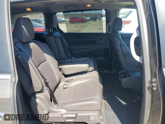 2018 Honda Odyssey EX-L with VIN 5FNRL6H78JB069850, listed as a Copart auction lot 49771875 with 103,914 mi miles and Salvage Title. Bid and sale history available at DreamBid. Image 11.