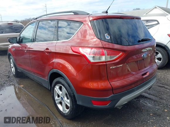 2016 Ford Escape SE with VIN 1FMCU9GXXGUB02932, listed as a IAAI auction lot 41797351 with 74,284 mi miles. Bid and sale history available at carsss.com. Image 3.