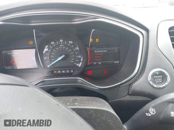 2016 Ford Fusion Titanium with VIN 3FA6P0K98GR150939, listed as a IAAI auction lot 40994523 with 144,051 mi miles. Bid and sale history available at carsss.com. Image 7.