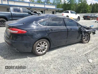 2020 Ford Fusion SE with VIN 3FA6P0HD2LR150490, listed as a Copart auction lot 55326215 with 101,457 mi miles and Salvage title. Bid and sale history available at DreamBid. Image 3.