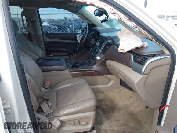 2015 Chevrolet Suburban LT with VIN 1GNSKJKC0FR309866, listed as a IAAI auction lot 41743848 with 220,778 mi miles and . Bid and sale history available at DreamBid. Image 5.