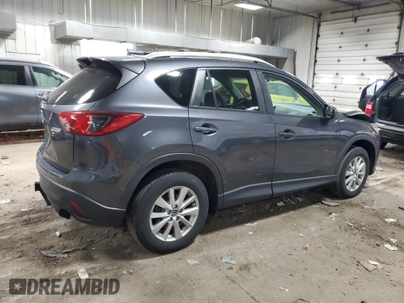 2016 Mazda CX-5 Touring with VIN JM3KE4CY9G0790872, listed as a Copart auction lot 54868385 with 82,569 mi miles and Clean Title. Bid and sale history available at carsss.com. Image 3.