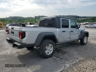 2023 Jeep Gladiator Sport S с VIN 1C6HJTAG8PL534103, выставлен на аукционе Copart как лот 63114795 с пробегом 42 054 миль миль и Списание • Salvage title. История ставок и продаж доступна на DreamBid. Изображение 3.