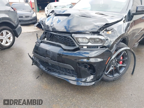 2023 Dodge Durango SRT Hellcat Premium with VIN 1C4SDJH90PC557375, listed as a IAAI auction lot 41328850 with 30,697 mi miles and . Bid and sale history available at DreamBid. Image 18.