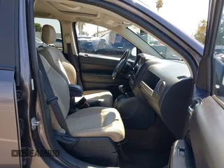 2016 Jeep Compass Sport SE z VIN 1C4NJDBBXGD729747, wystawiony jako IAAI lot #42642509 z przebiegiem 157 774 mil mil oraz . Historia ofert i sprzedaży dostępna na DreamBid. Obrazek 5.