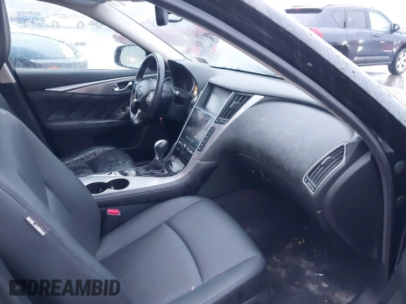 2015 Infiniti Q50 Premium z VIN JN1BV7ARXFM412382, wystawiony jako IAAI lot #40776813 z przebiegiem 66 406 mil mil oraz . Historia ofert i sprzedaży dostępna na DreamBid. Obrazek 5.
